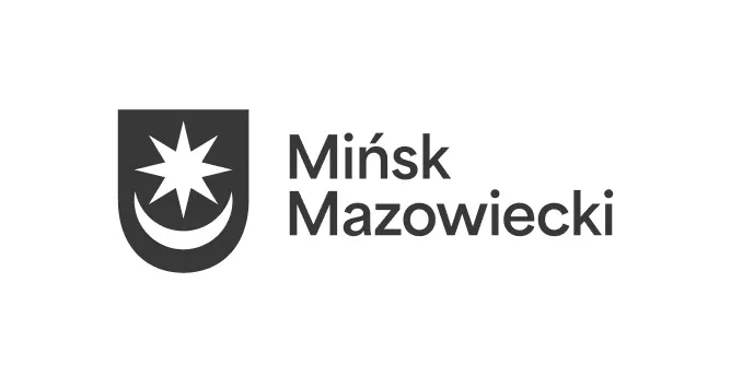 Herb miasta z ośmioramienną gwiazdą nad półksiężycem oraz napis „Mińsk Mazowiecki”.