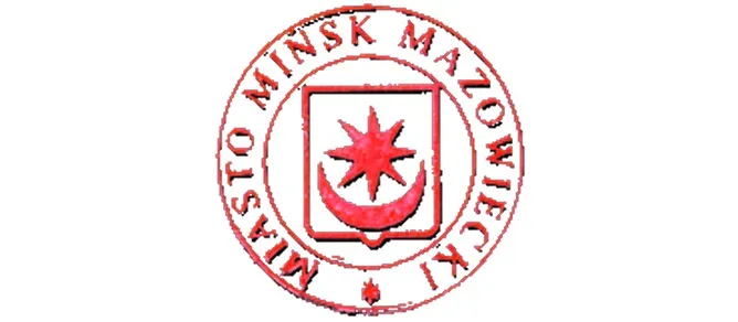 Czerwony okrągły herb z ośmioramienną gwiazdą i półksiężycem w środku oraz napisem „Miasto Mińsk Mazowiecki” wokoło.